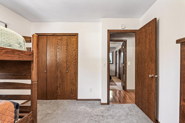 4128 Zane Ave N, Robbinsdale, MN 55422 - carpeted bedroom featuring a closet and baseboards