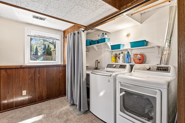 4128 Zane Ave N, Robbinsdale, MN 55422 - washroom with independent washer and dryer, wainscoting, wood walls, and light colored carpet