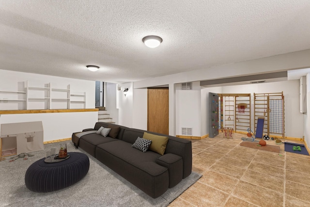 4128 Zane Ave N, Robbinsdale, MN 55422 - living room featuring a textured ceiling and stairs