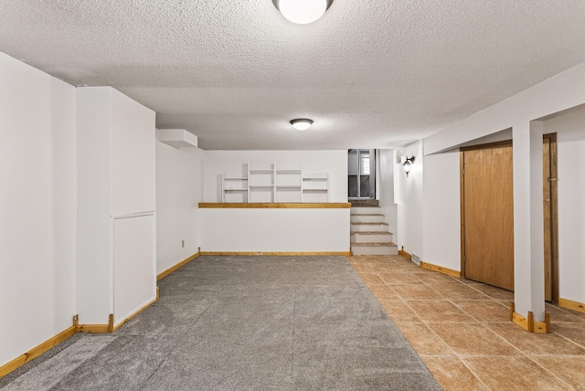 4128 Zane Ave N, Robbinsdale, MN 55422 - finished basement with a textured ceiling and stairway