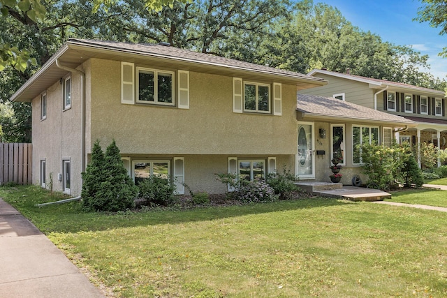 4128 Zane Ave N, Robbinsdale, MN 55422 - tri-level home featuring stucco siding