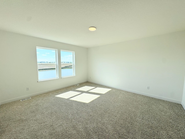 2455 Jandell Ave NE, Saint Michael, MN 55376 - carpeted empty room featuring baseboards