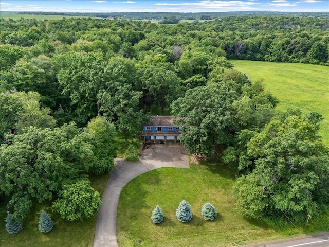 2224 75th Ave Unit M, Osceola, WI 54020 - view of subject property with a heavily wooded area