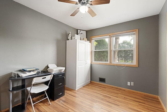 522 14th St NE, Owatonna, MN 55060 - office space featuring light wood-style floors and a ceiling fan