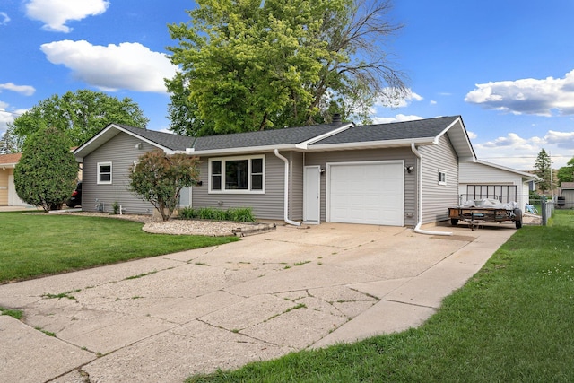 522 14th St NE, Owatonna, MN 55060 - single story home featuring a garage, driveway, a front lawn, and roof with shingles