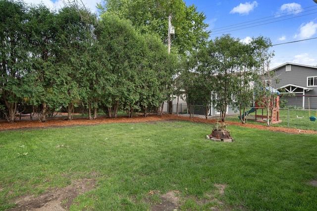 522 14th St NE, Owatonna, MN 55060 - view of yard with a fire pit
