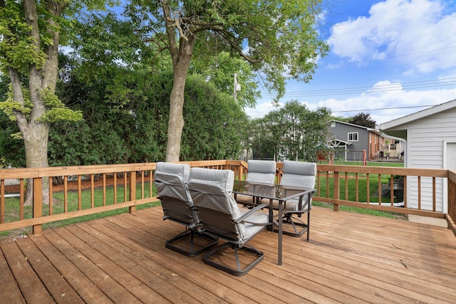522 14th St NE, Owatonna, MN 55060 - wooden terrace featuring outdoor dining area