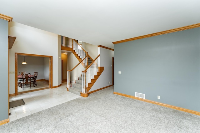 4354 48th St NE, Haverhill Twp, MN 55906 - basement featuring stairway, carpet flooring, ornamental molding, and tile patterned flooring