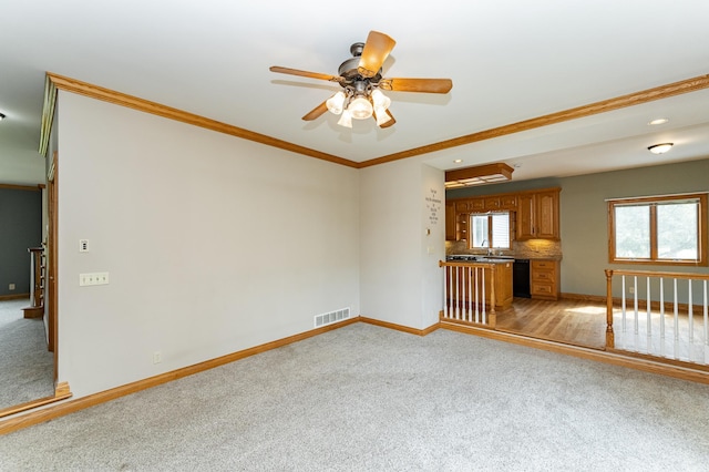 4354 48th St NE, Haverhill Twp, MN 55906 - spare room featuring light carpet, ceiling fan, recessed lighting, and crown molding