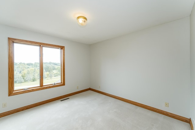 4354 48th St NE, Haverhill Twp, MN 55906 - spare room with light colored carpet and baseboards
