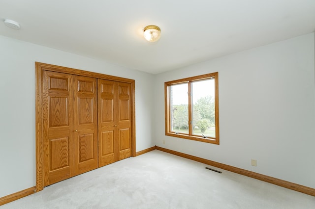 4354 48th St NE, Haverhill Twp, MN 55906 - unfurnished bedroom featuring carpet floors and a closet