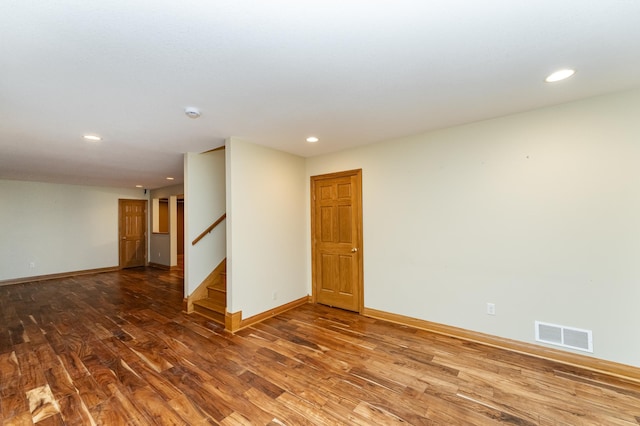 4354 48th St NE, Haverhill Twp, MN 55906 - empty room featuring wood finished floors, recessed lighting, and stairway