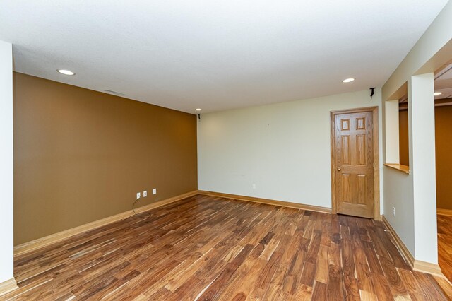 4354 48th St NE, Haverhill Twp, MN 55906 - spare room featuring wood finished floors and recessed lighting