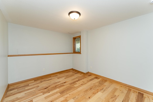 4354 48th St NE, Haverhill Twp, MN 55906 - empty room featuring wood finished floors and baseboards