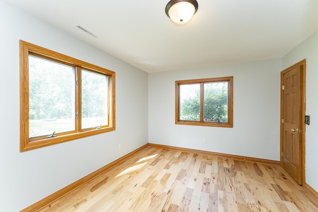 4354 48th St NE, Haverhill Twp, MN 55906 - spare room with light wood-type flooring and baseboards