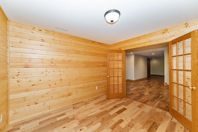 4354 48th St NE, Haverhill Twp, MN 55906 - spare room with wooden walls and wood finished floors