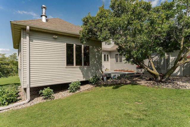 4354 48th St NE, Haverhill Twp, MN 55906 - rear view of house featuring a yard and a shingled roof