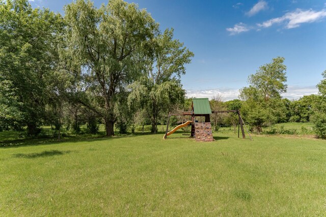 4354 48th St NE, Haverhill Twp, MN 55906 - view of grassy yard with a playground