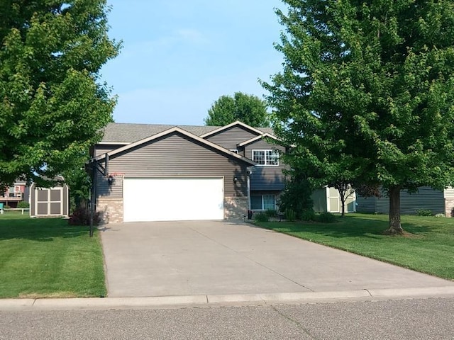 608 11th Ave SW, Rice, MN 56367 - view of front facade featuring an attached garage, a front yard, and concrete driveway