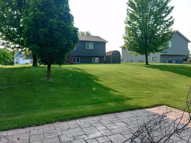 608 11th Ave SW, Rice, MN 56367 - view of green lawn featuring stairway