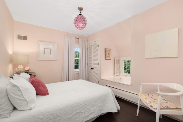 1064 Lombard Ave, Saint Paul, MN 55105 - bedroom with multiple windows, a closet, and dark wood-style flooring