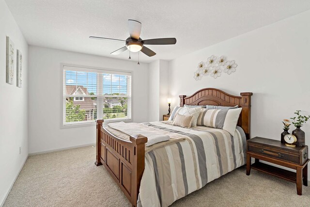 5315 Ranchview Ln N, Plymouth, MN 55446 - bedroom featuring light colored carpet and a ceiling fan
