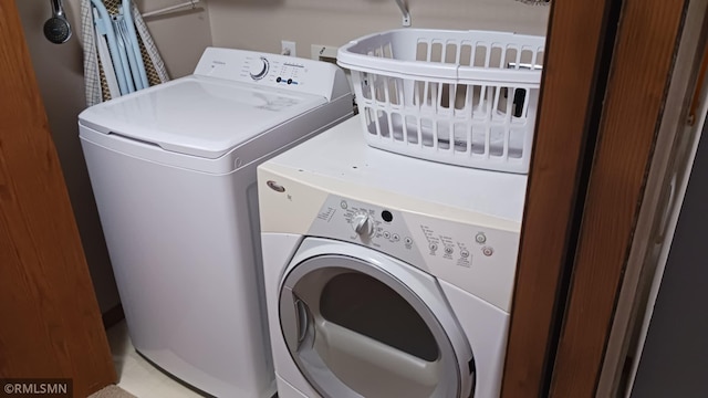 10933 57th St NE, Albertville, MN 55301 - laundry room featuring separate washer and dryer