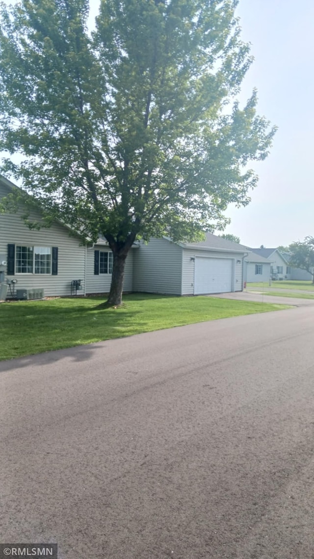 10933 57th St NE, Albertville, MN 55301 - view of front of home featuring a front yard and driveway