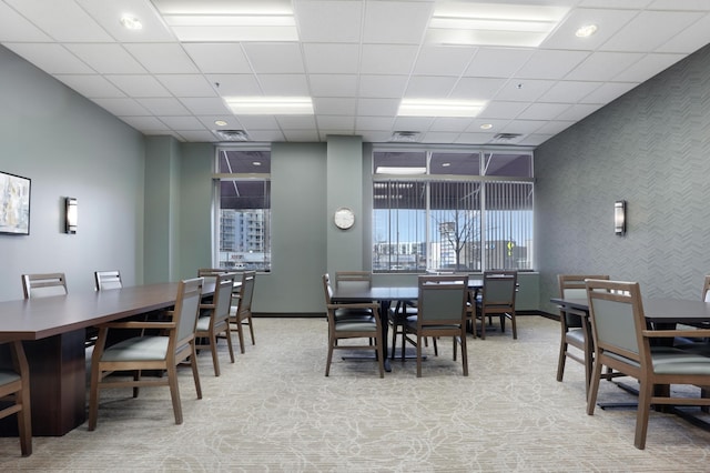 6600 Lyndale Ave S Unit 503, Richfield, MN 55423 - dining space with light colored carpet and a paneled ceiling