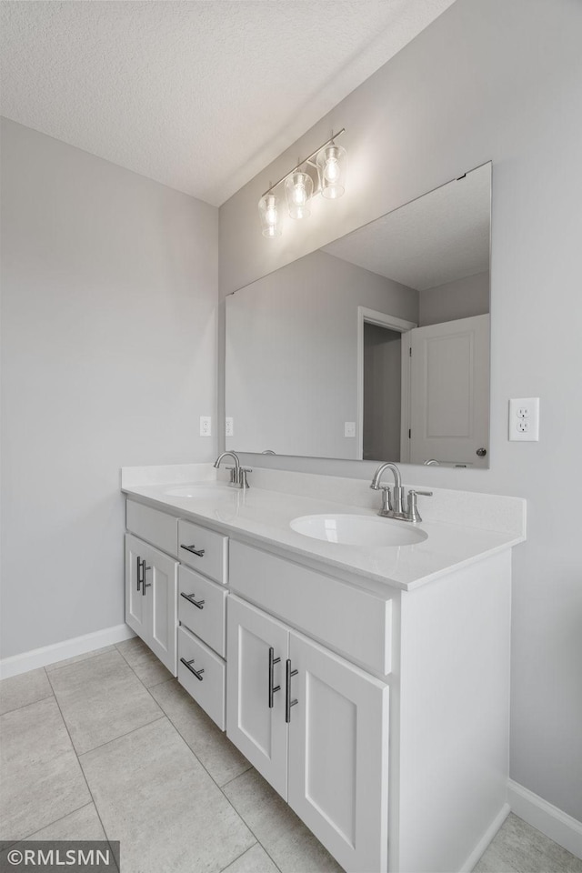 17205 61st St NE, Otsego, MN 55330 - full bath featuring double vanity, a textured ceiling, and tile patterned floors
