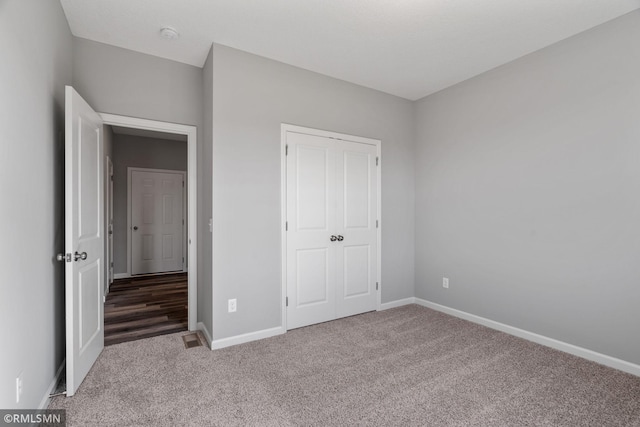 17205 61st St NE, Otsego, MN 55330 - unfurnished bedroom featuring carpet and a closet