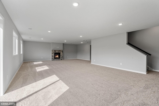 17205 61st St NE, Otsego, MN 55330 - unfurnished living room with carpet floors, recessed lighting, and a fireplace