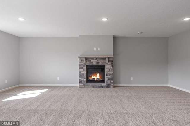 17205 61st St NE, Otsego, MN 55330 - unfurnished living room featuring carpet, a fireplace, and recessed lighting