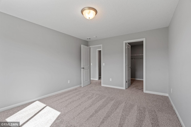 17205 61st St NE, Otsego, MN 55330 - unfurnished bedroom with carpet flooring and a walk in closet