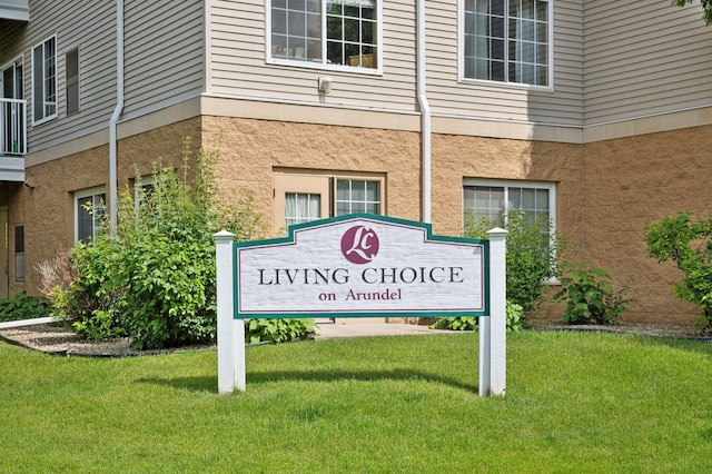 1600 Arundel St Unit 201, Saint Paul, MN 55117 - community sign featuring a lawn