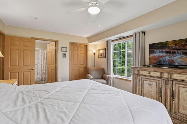 1600 Arundel St Unit 201, Saint Paul, MN 55117 - bedroom with ensuite bath and a ceiling fan