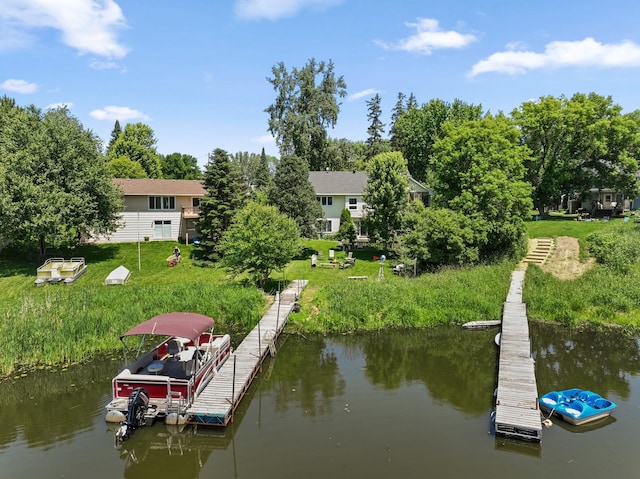 30190 Terryll St, Lindstrom, MN 55045 - dock featuring a water view, a lawn, and view of scattered trees
