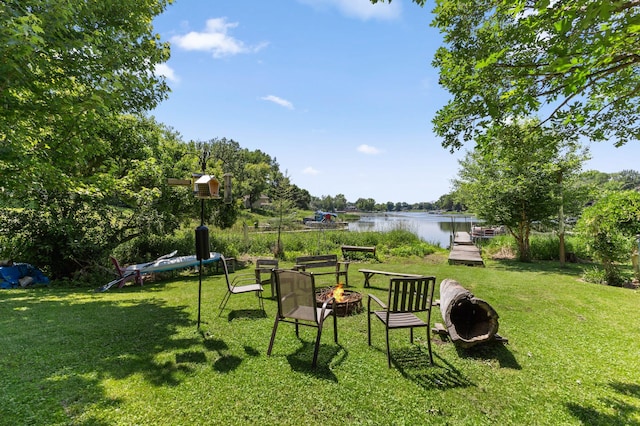 30190 Terryll St, Lindstrom, MN 55045 - view of grassy yard featuring an outdoor fire pit and a water view