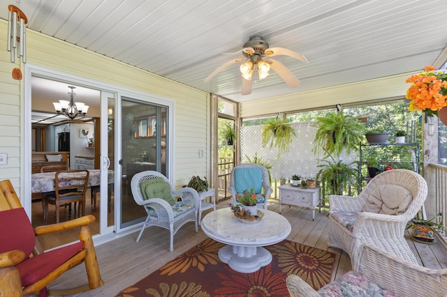 30190 Terryll St, Lindstrom, MN 55045 - sunroom featuring a chandelier, ceiling fan, and plenty of natural light