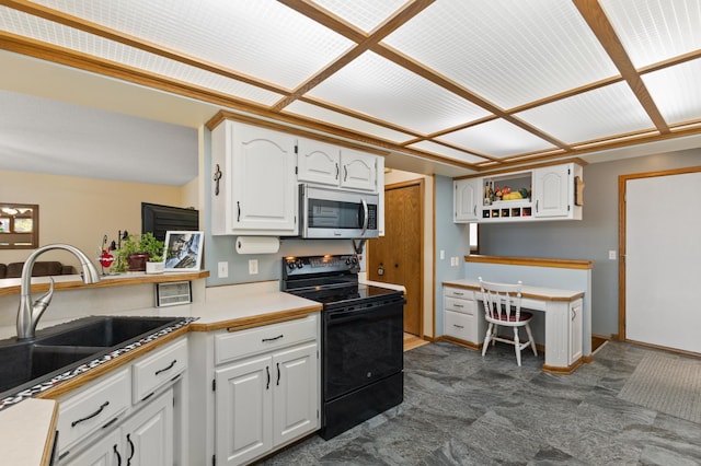 30190 Terryll St, Lindstrom, MN 55045 - kitchen with stainless steel microwave, black electric range, open shelves, white cabinets, and a desk