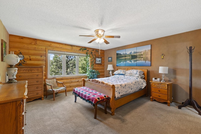 30190 Terryll St, Lindstrom, MN 55045 - bedroom featuring carpet flooring, a textured ceiling, a ceiling fan, and log walls