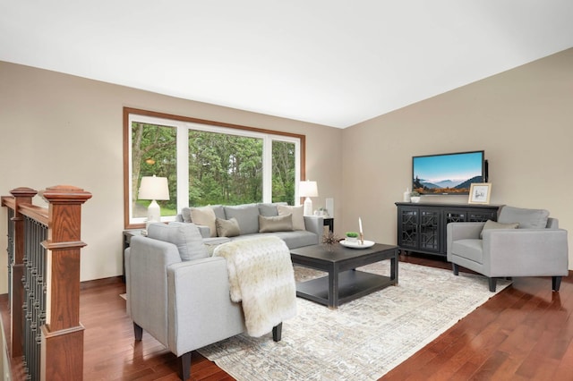 14744 Evergreen St NW, Andover, MN 55304 - living area with dark wood-type flooring and baseboards