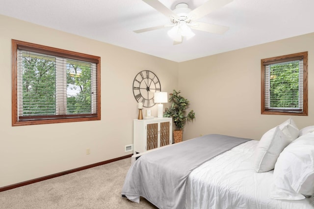 14744 Evergreen St NW, Andover, MN 55304 - bedroom featuring light colored carpet and ceiling fan