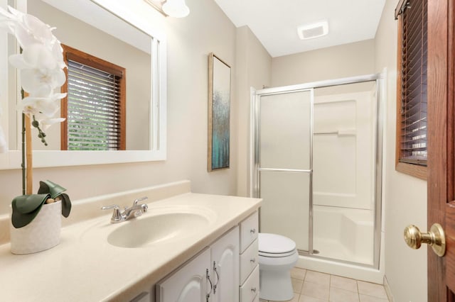 14744 Evergreen St NW, Andover, MN 55304 - bathroom featuring a shower stall, tile patterned floors, and vanity