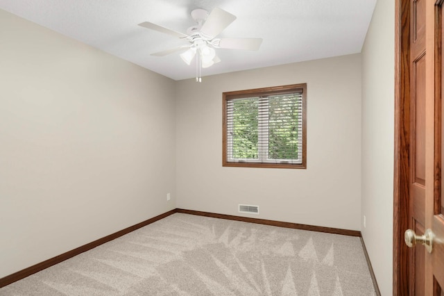 14744 Evergreen St NW, Andover, MN 55304 - carpeted spare room with baseboards and ceiling fan