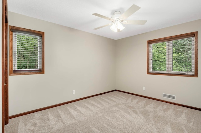 14744 Evergreen St NW, Andover, MN 55304 - unfurnished room with carpet flooring and a ceiling fan