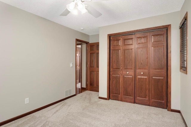 14744 Evergreen St NW, Andover, MN 55304 - unfurnished bedroom featuring carpet flooring, a closet, and ceiling fan