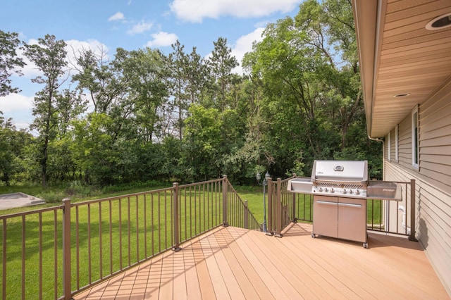 14744 Evergreen St NW, Andover, MN 55304 - wooden deck featuring a grill, a yard, and view of scattered trees
