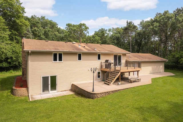 14744 Evergreen St NW, Andover, MN 55304 - rear view of property with a patio, a deck, a yard, stairway, and a chimney