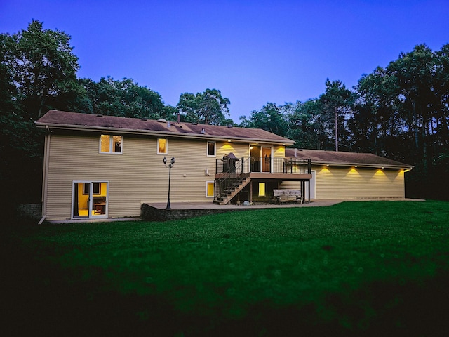 14744 Evergreen St NW, Andover, MN 55304 - rear view of property with stairs, a patio, a wooden deck, and a lawn